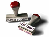 photo of stamps that read under budget and on time.