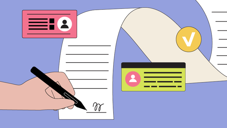 A hand signs a purchase agreement.