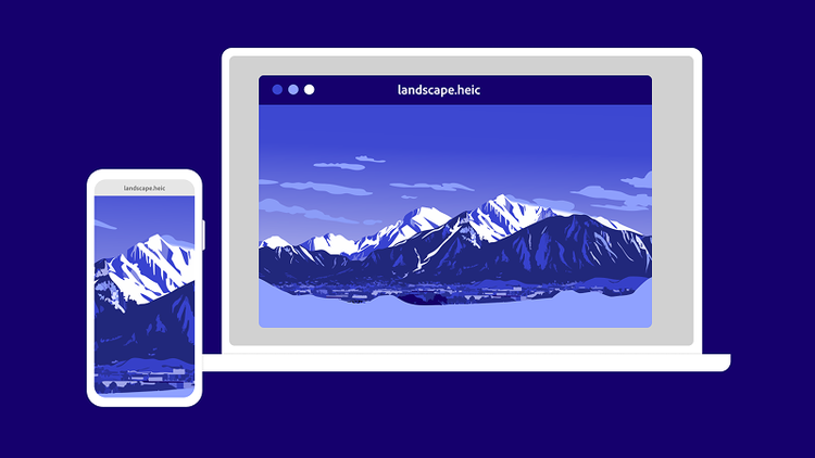 A laptop and an iPhone both display an .heic extension image of mountains with purple hues.