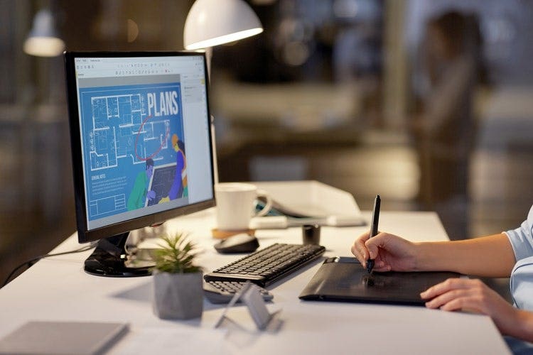 A person draws on a PDF while using Windows 10.