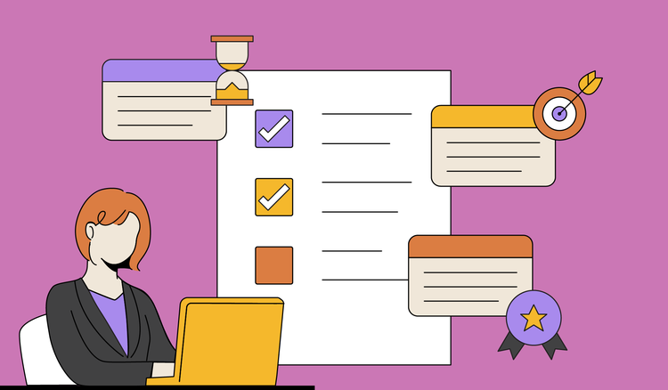 A woman sitting at a desk types out SMART goals in a document on her laptop.