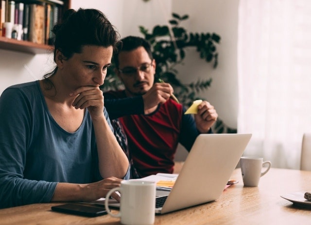 A photo of two people working on an advance directive.