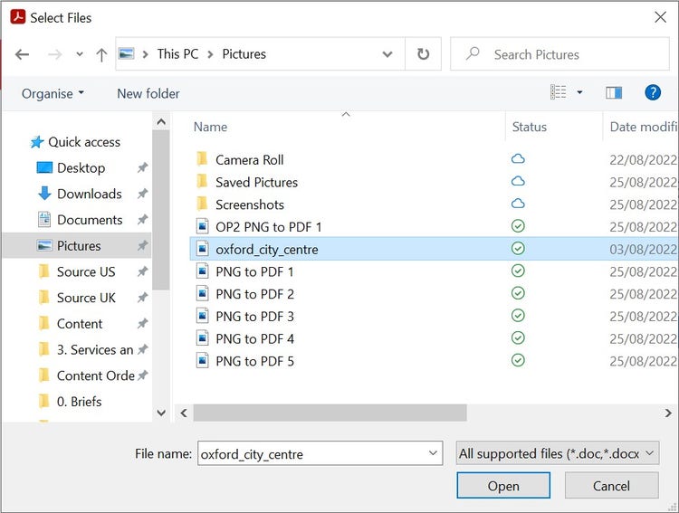 A screenshot of a File Explorer popup that has several document folders and image files displayed.