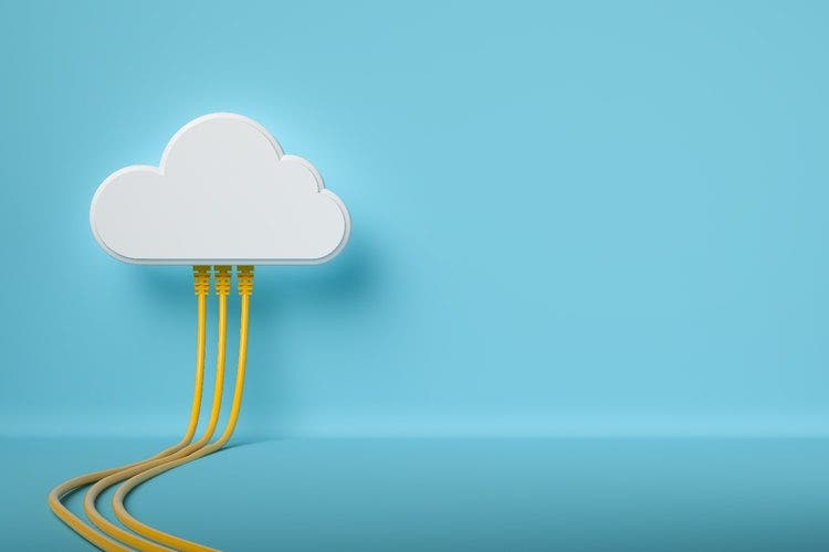 Illustration of a cloud on a blue background connected to computer network cables.