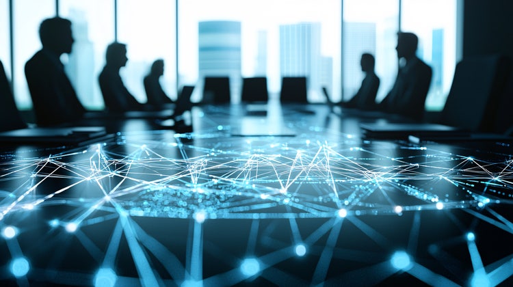 Business leaders at a boardroom table with AI network graphics overlay in a modern office