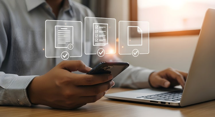Mobile app and laptop used to streamline document management workflow for efficient task completion.