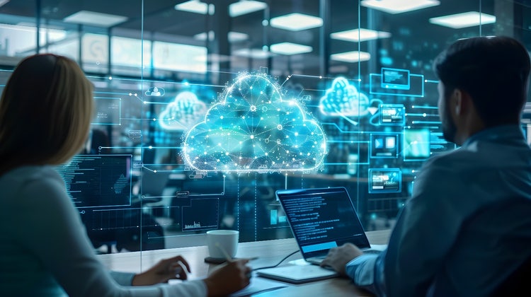 High-tech office with a team discussing cloud computing strategies on digital whiteboards showing business document workflows.