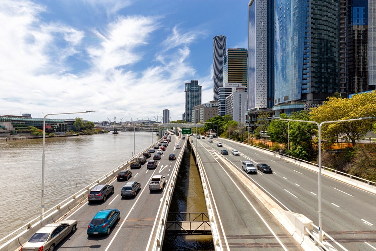 A shot of Brisbane city showing diagonal lines of highways and buildings.