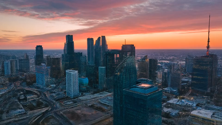 Photo of a city at the sunset