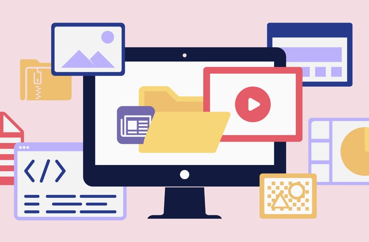 Um computador desktop com várias abas e arquivos ao redor.