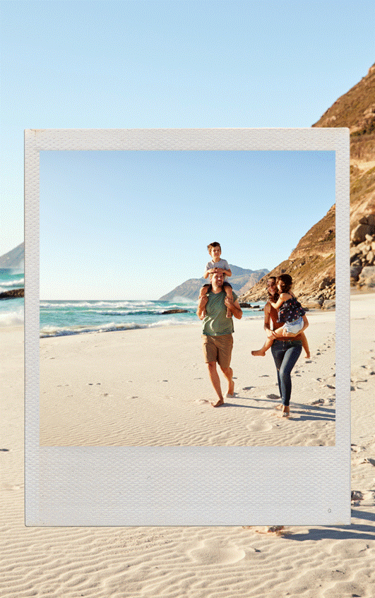 A group of people walking on a beach AI-generated content may be incorrect.