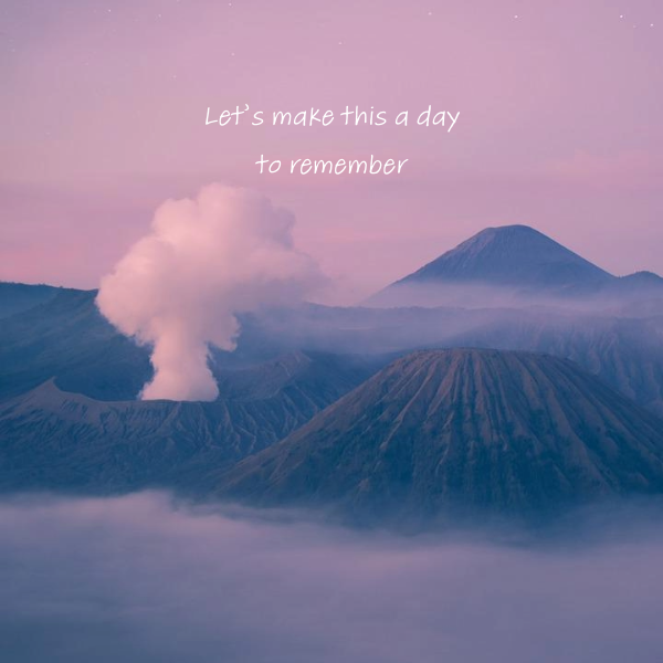 A mountain range with smoke coming out of the top AI-generated content may be incorrect.