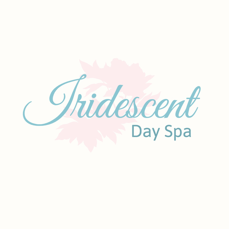 Tridescent Day Spa logo written in the fonts Great Vibes and Asap in blue with the shadow of light pink leaves in the background