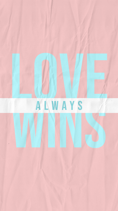 "Love always wins" against a pink sheet