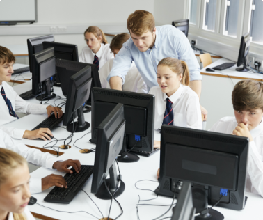 School children learning online with on-site guidance