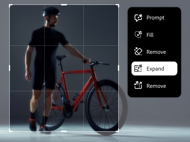 Un ciclista in piedi accanto a una bicicletta rossa all’interno di un’interfaccia di editing delle immagini, con lo strumento Espandi selezionato per estendere l’immagine oltre i bordi originali.