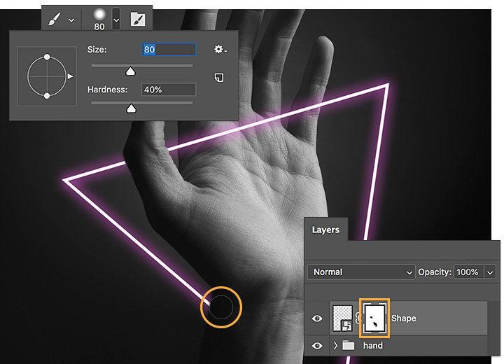 Brush with black to create photoshop mask to hide parts of the shape in front of the wrist and thumb