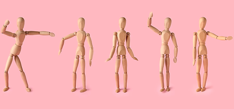 stop motion animation of a wooden dummy in different poses