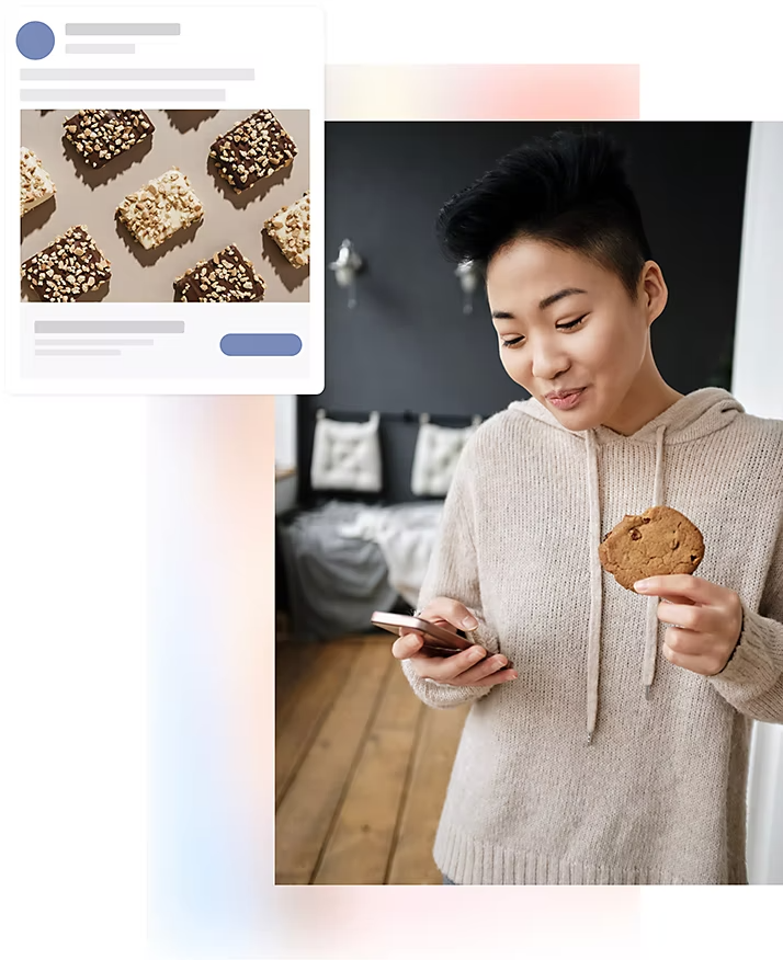 An image of person standing and looking at their phone while holding a cookie in their other hand and a Facebook ad is superimposed over the image