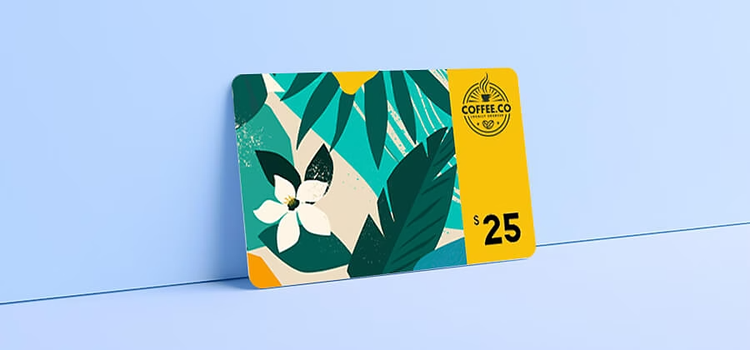 A coffee shop gift card with a custom design against a blue backdrop