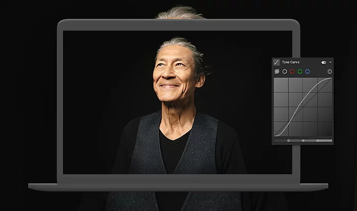 Adjusting the Tone curve of a photo on a laptop with Adobe Lightroom
