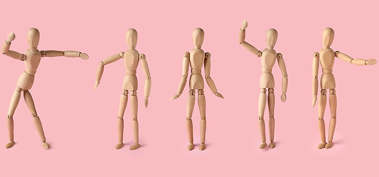 stop motion animation of a wooden dummy in different poses