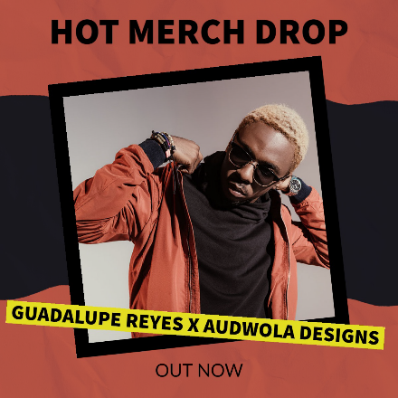 "Hot Merch Drop – Out Now" product promotional post with a person adjusting their orange-brown jacket