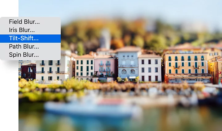 Tilt-Shift-Effekt, angewendet auf ein Bild von Gebäuden am Wasser