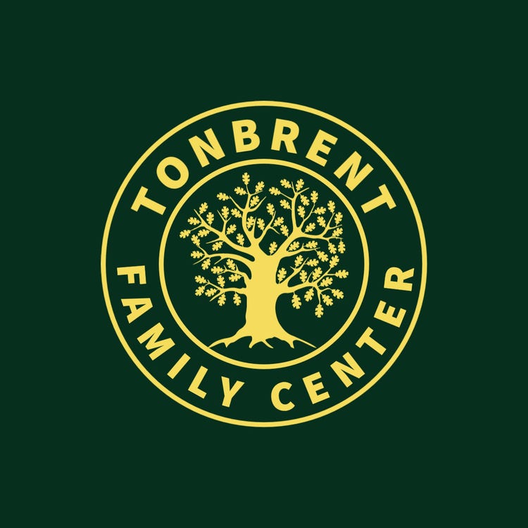 Emerald and Gold Tree Family Center Logo