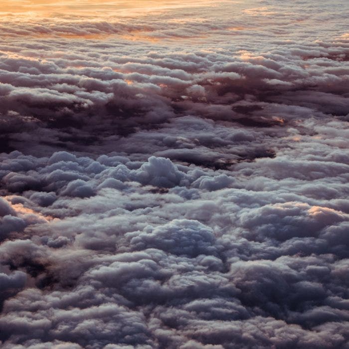 View above the clouds, illuminated by the sun.