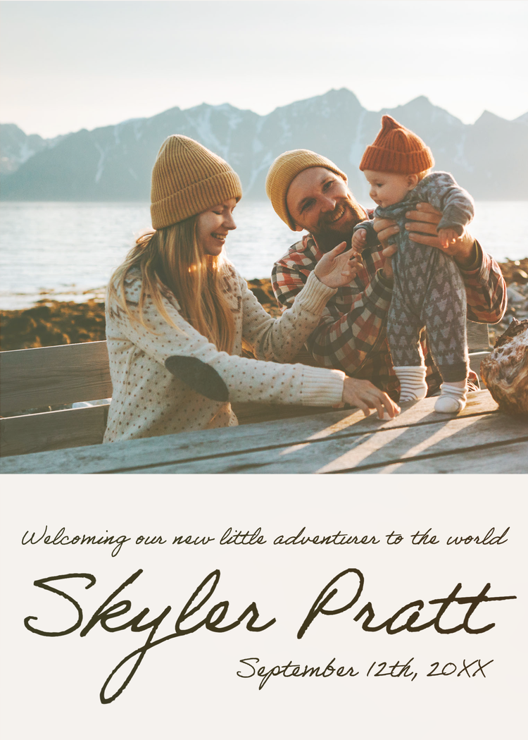 "Welcoming our new little adventurer to the world Skyler Pratt" birth announcement with a family sitting at a table with a lake and mountains in the background