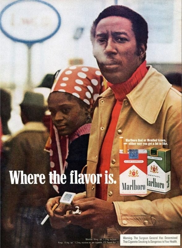 Colorful photographic image of a Black man smoking wearing a red turtleneck and tan leather jacket. The background features a Black woman and a crowd. An image of Marboro cigarettes and the tagline "Where the flavor is" is laid over the image.
