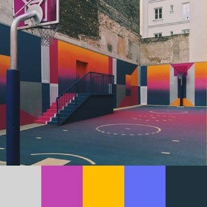 A color palette created from an image of a basketball court painted pink, yellow, and blue
