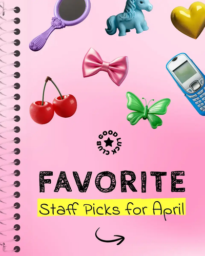 Staff picks of a spiral notebook and fun props from cherries to a bowtie.