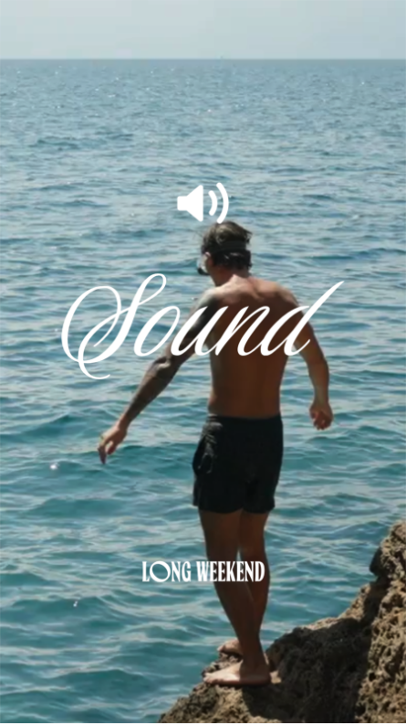 A man in a swim suit about to jump off a cliff into the ocean with the words