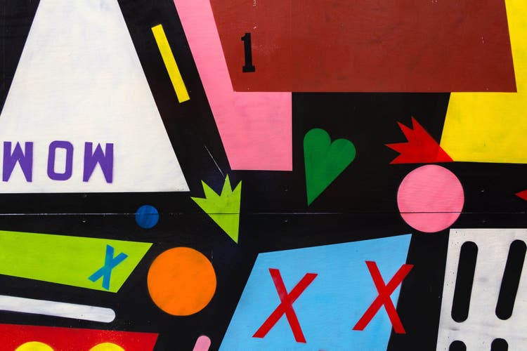 Abstract header image featuring a mixture of shapes and bold colors.