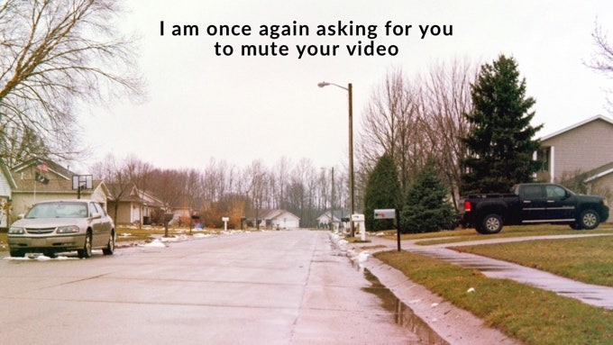 Zoom background of a street with parked cars and houses that says "I am once again asking for you to mute your video"