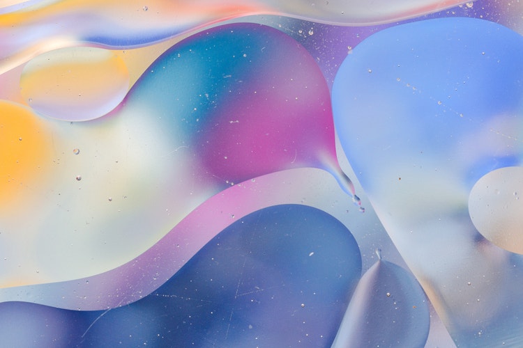 pastel purples, pinks, blues, and yellows create a wavy look