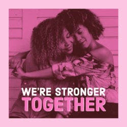 Pink image featuring a photograph of two women hugging