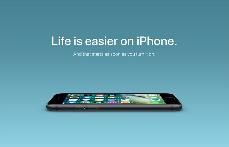 An Apple marketing campaign with a picture of an iPhone with the words "Life is easier on iPhone. And that starts as soon as you turn it on."