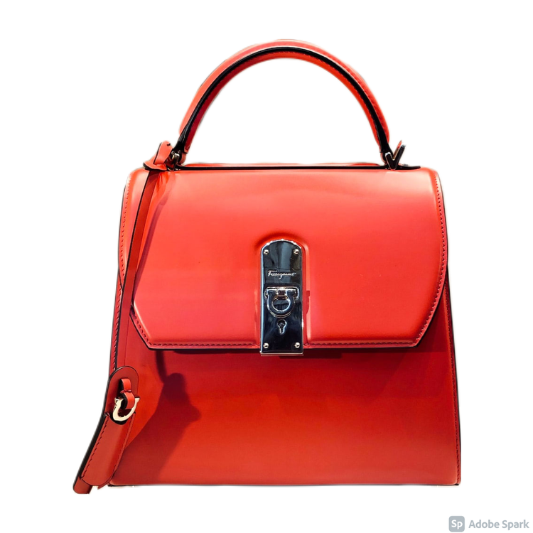 Red purse against white background