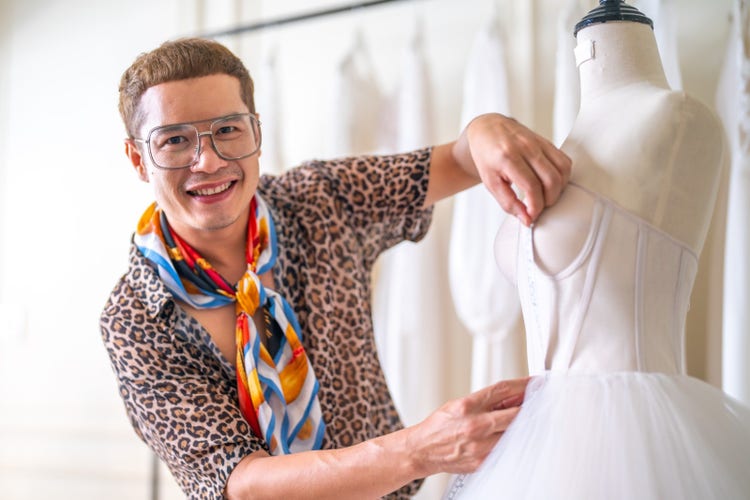A fashion designer who uses their Facebook Business Page to grow their brand