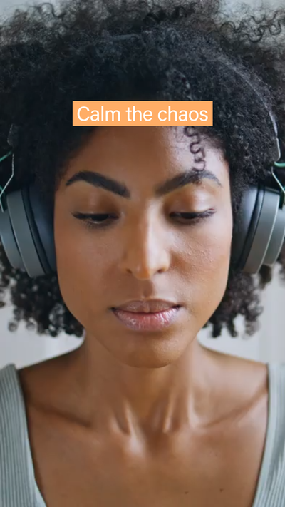 Example of a LinkedIn video ad template with a Black woman wearing headphones and caption saying calm the chaos.