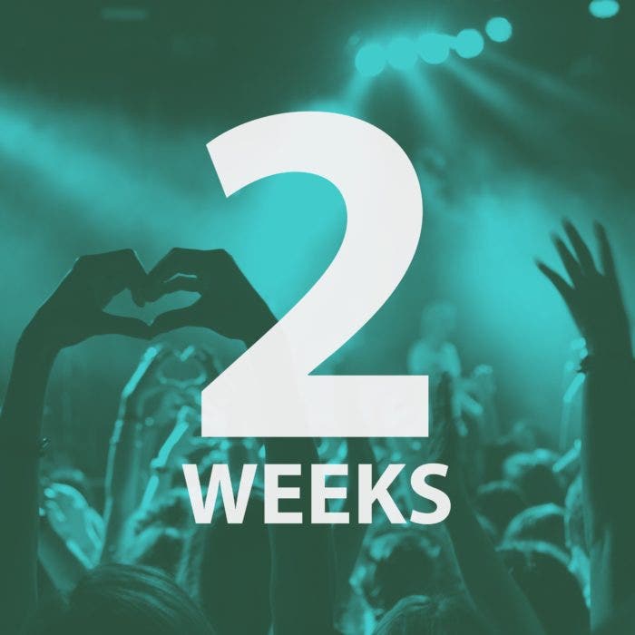 Group of people enjoying a party. The graphic is using a green filter and features the text "2 weeks".