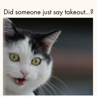 A cat with its mouth open Description automatically generated with medium confidence