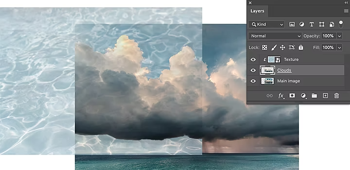 Pilviä ja vettä yhdistettynä Adobe Photoshopin kuvien kerrostustyökalulla.