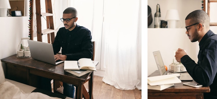 A landlord working on a termination letter using their laptop at their desk