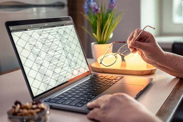 A person using a laptop while working on watermark PDF documents