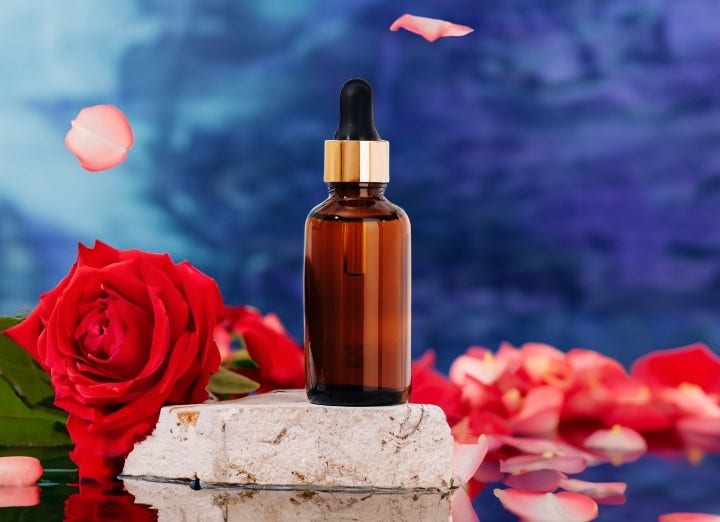 Product photo of bottle and flower with wooden boards and red ribbon background generated with AI