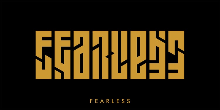 A bold ambigram design of the word "FEARLESS", crafted to read the same when flipped, showcasing symmetry and confident typography.